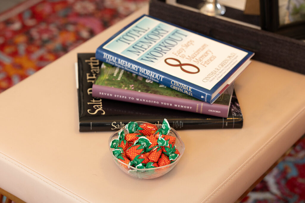Memory care books and caregiver resources displayed in senior care setting